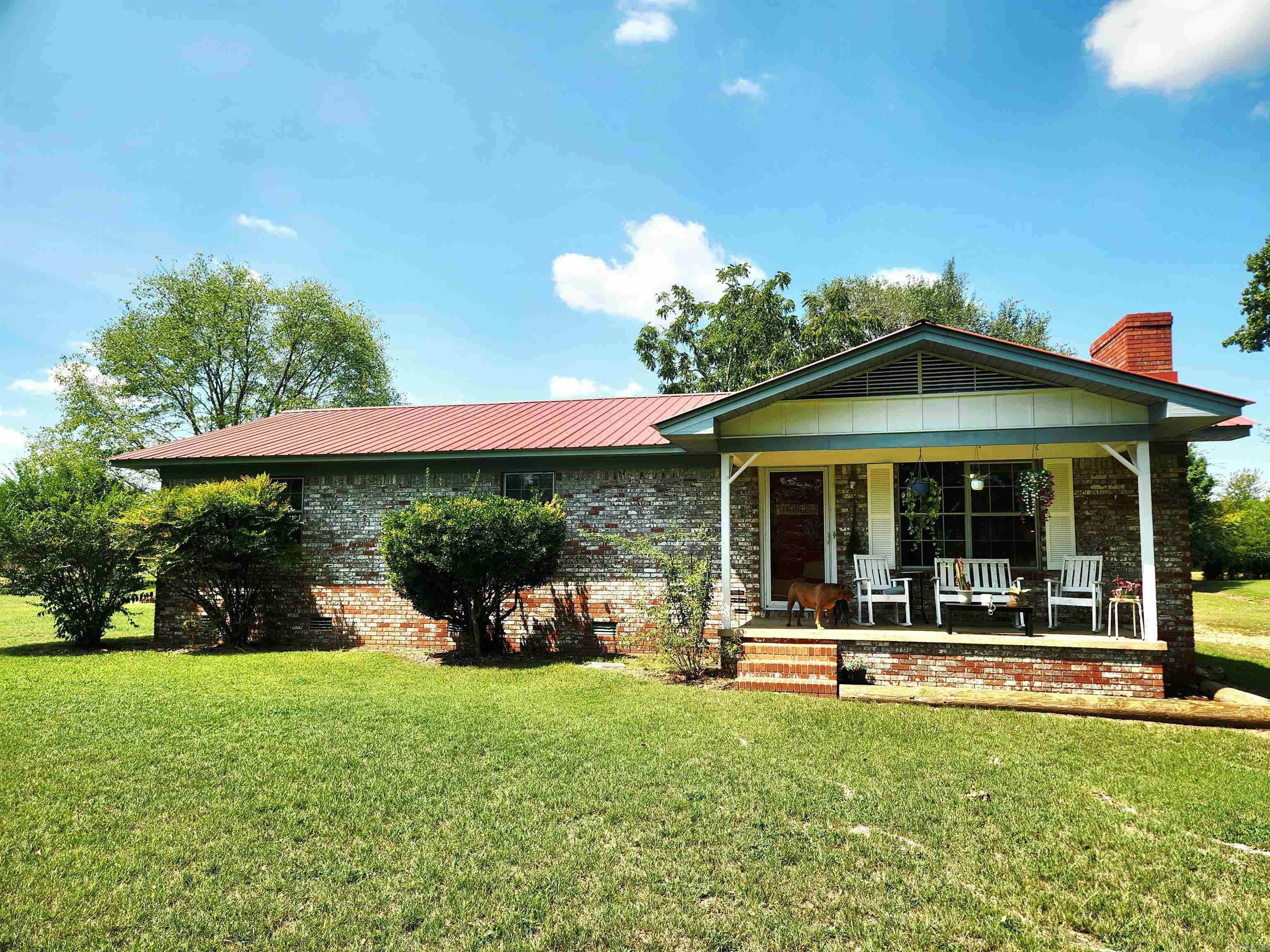 This cozy home located just 15 minutes out of Malvern offers so much! The natural light is amazing; you can set out on the back covered porch and enjoy the view. Home is in prime location with cell service. Recent updates include HVAC, metal roof, LVP flooring, hot water tank, stove, microwave & dishwasher. Schedule your showing today. SEE AGENT REMARKS
