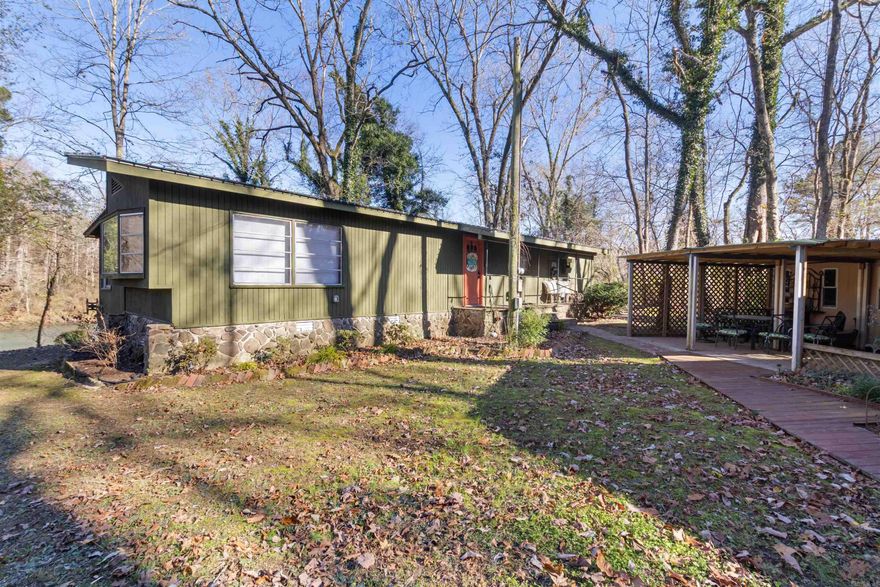 Escape to your own riverfront oasis on the famous Little Red River—home to some of the best trout fishing in the entire state. This well-kept 3 bedroom, 2 full bath mobile home sits on a permanent foundation and offers comfort, convenience, and unbeatable water access. Step outside to your private retreat featuring a fantastic fishing dock with two boat slips, making it perfect for anglers, boaters, and anyone who loves spending their days on the water. Enjoy peaceful mornings on the riverbank, fantastic fishing right from your backyard, and quiet evenings surrounded by nature. Inside, the home offers a functional layout with a spacious living area, full kitchen, and a primary suite with its own bathroom. Whether you’re looking for a full-time home, weekend getaway, or short-term rental opportunity, this property checks every box. Riverfront living, unmatched fishing, and all the amenities you need—your Little Red River escape awaits. Book your private showing today!