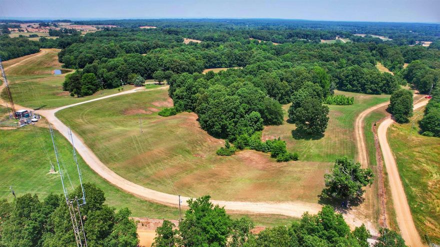 101 +/- acres of rolling pastures and woods is located at 19237 Raby Road on beautiful Crowley's Ridge just outside the city limits of Harrisburg and south of Jonesboro. With a brand new 32'x 56' 2023 year model manufactured home and 20'x 50' barn/shed this property is ready to go! This property has an abundance of deer, turkey and other wildlife. Don't miss out on this rare opportunity to own land on The Ridge.
