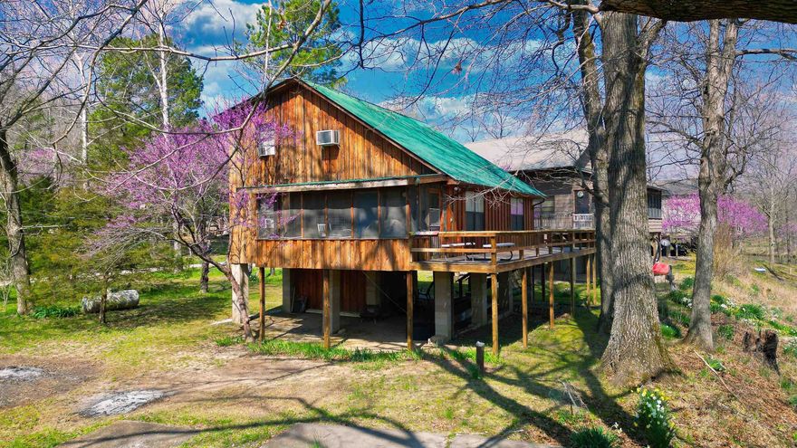 SPRINGWOOD ACRES AKA " SPRING RIVER SPLENDOR/ MYATT CREEK MAGNIFICENT" YES! THIS SPOT!!, THE SPOT!! where the crystal clear warm waters of the amazing Ozark stream called Myatt creek gently flows into the cool healing waters of the World Famous, Spring River! to say this place is " stunning" well that would be an understatement!!!  Absolute Nature at its best ,world class fishing, exciting float trips, swimming "warm or cold" waters,  Eagles soaring,  Osprey showing off their fishing skills daily AND after a fun filled day on the river, relaxation comes "EASY" taking it all in while enjoying your large open deck or private screened in porch all while listening to the soothing water as it runs through these drop dead gorgeous rapids, AND don't forget that all important,  hard to find EASY river access! YES!!  This beautifully maintained 4 BR 2 Bath open kitchen, open living area makes it  EASY to appreciate escaping today's world when you arrive at your Special  River cabin each time, If you are curious about the EASY river living that you have always heard about, come check out where the crystal warm waters meet the cool heaing waters,  the Ozarks water ways at their best!!!