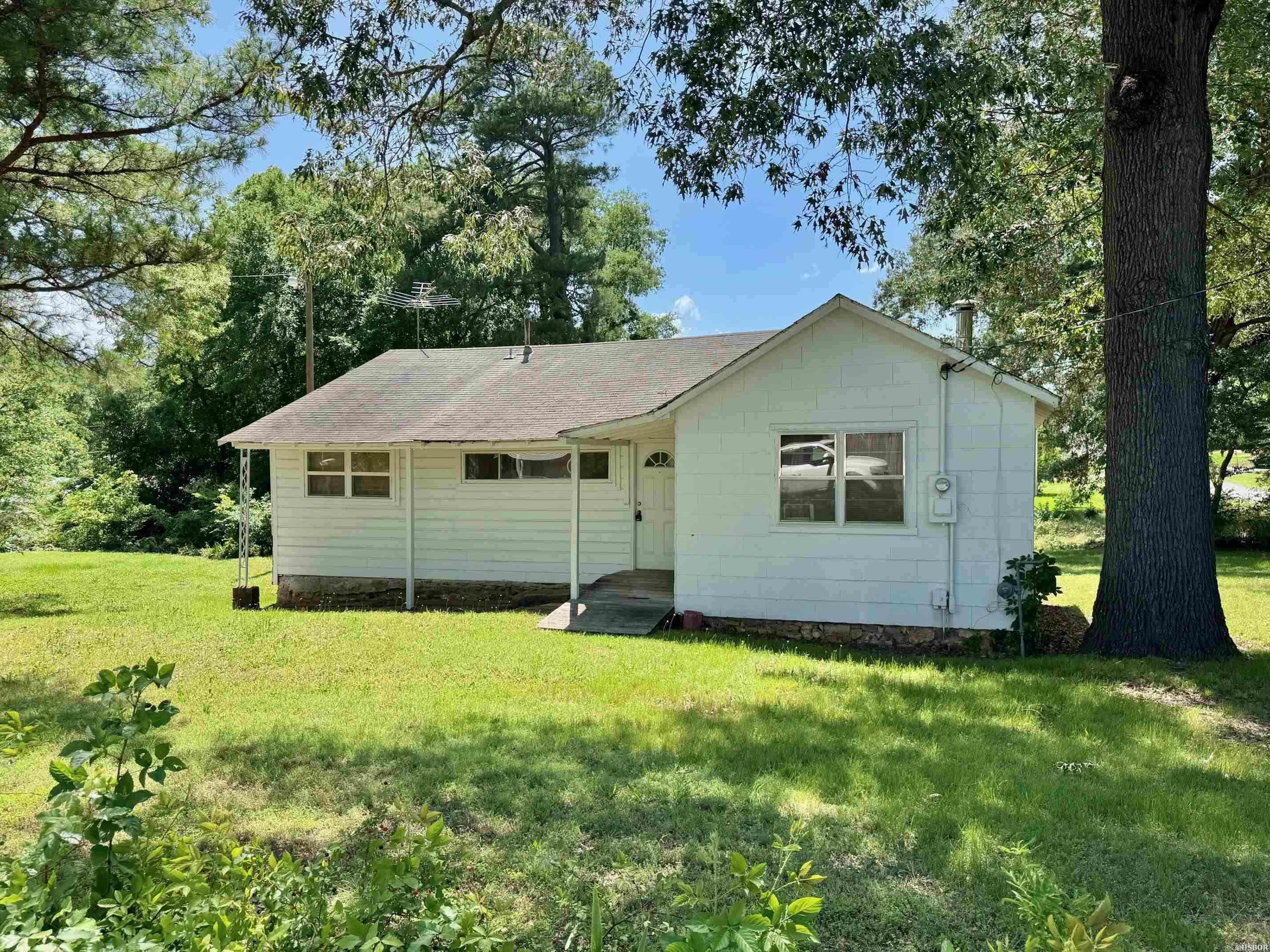 This 3-bedroom, 1-bath home sits on a spacious double lot just behind Oaklawn racetrack and offers a rare opportunity for the right buyer with vision. The home needs TLC and will require a complete renovation; however, the potential here is undeniable. With plenty of room to build an additional home, garage, or guest house, this property could be ideal for redevelopment or a long-term investment. Whether you choose to restore the existing structure or start fresh, the location and lot size offer a strong upside. Property is being sold as-is. Bring your contractor, your creativity, and your plans ā this is a project worth considering.