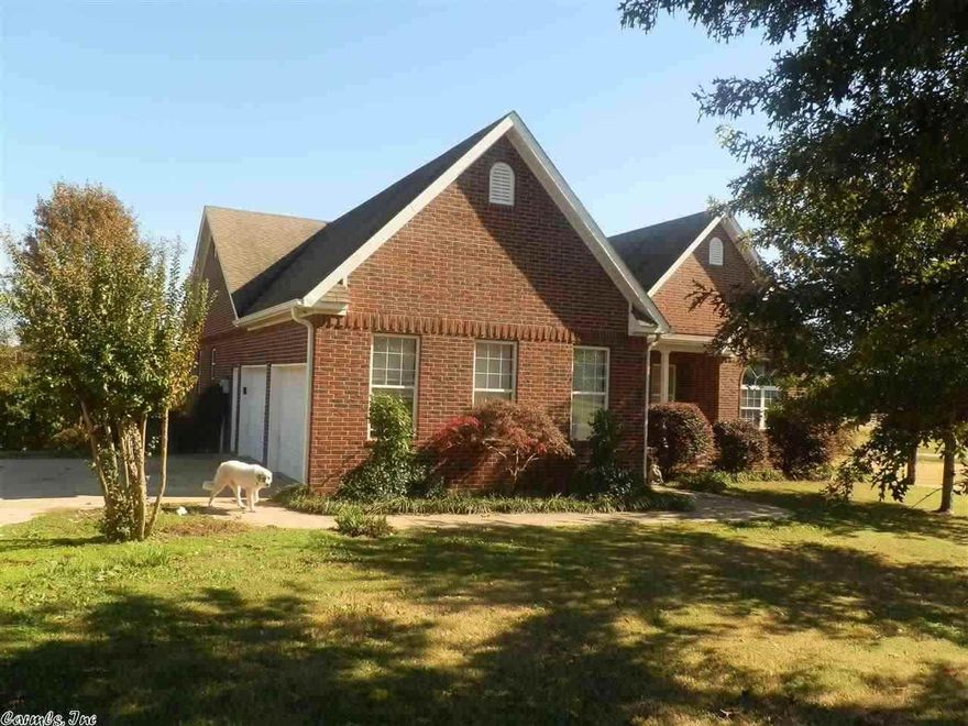 Gleaming hardwood floors throughout this spacious five bedroom, 3 bath home. The master suite features a separate seating area with a french door leading out to an upper level wooden deck overlooking an in-ground swimming pool and a waterfall flowing into a Koi pond. The kitchen opens up to a large living space perfect for entertaining. The downstairs features an additional living space, two bedrooms, a full bath, and a shop with a separate garage door entrance.