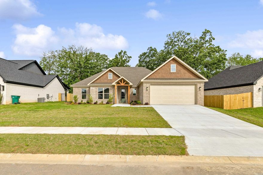 Spectacular new construction home offering 2200 sq ft with 4 bdrms/2 baths. This home is a must see with so many beautiful features. Open kitchen with large island, custom cabinets, vaulted ceiling with brick fireplace in living room, wood beams, large walk in pantry, large primary suite with wood beams, walk in closet & bath with freestanding tub. This home has so many custom features with a great flat back yard.