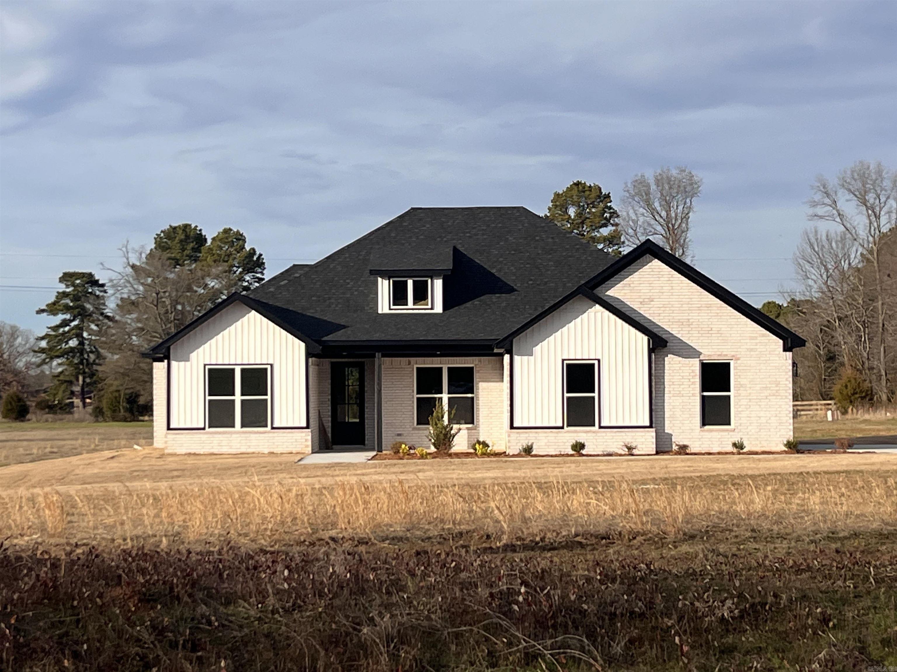 Beautiful new construction home in the country! This home offers 2256 sq ft, 4 bdrm, 2 baths, all on one level. Open kitchen with large island, custom cabinets, brick fireplace, Beans on ceiling in living room, large walk in pantry, large primary suite with beams on ceiling, great primary walk in closet & bath. This home has so many custom features! The backyard is beautiful with lots of space.