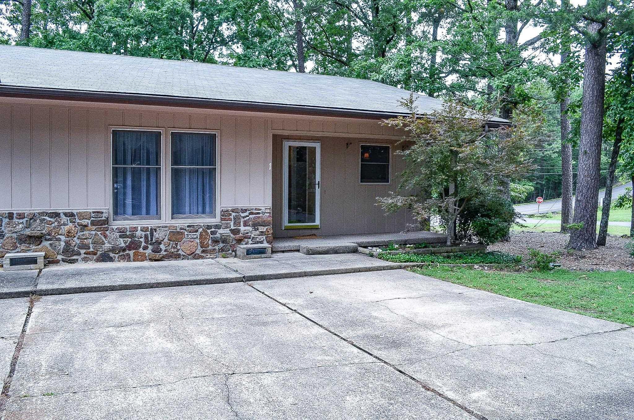 Very nice single-level MOVE IN READY townhome near West Gate area of Hot Springs Village. This end unit offers a bright and sunny interior plus full-time use sunroom. Enjoy viewing the wildlife from the comfort of your private deck! Many updates since 2018 include brand new LVP flooring & brand new carpet in the bedrooms 2025; primary bathroom has been updated 2025. Fresh paint both inside and out 2025 and the deck with stairs. HVAC 9/2017, WH 9/2017, Roof 2025. HSVPOA monthly $113.19, HSVTHA monthly $73 plus $27 trash pickup. Schedule your showing today! Agents SEE REMARKS