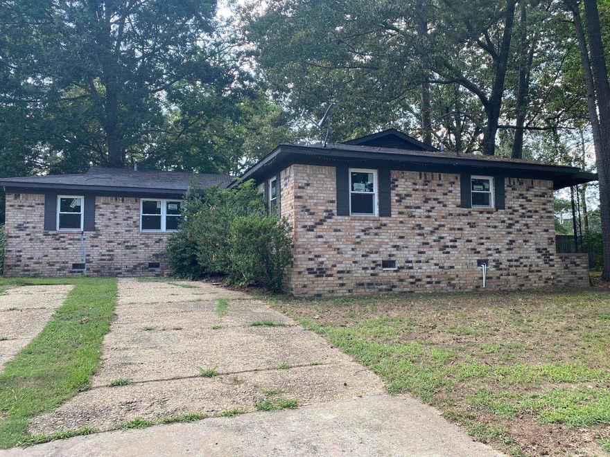 Mainly ALL Brick home off of John Barrow.  It features a deck and plenty of room to grow. Close to shopping, dining, schools and entertainment.  Agents see confidential agent remarks for additional information and showing instructions.