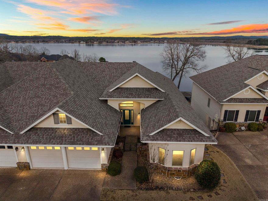 Only 8 of these prestigious townhomes in the Village and they only come available about every 10 years! HERE'S YOUR CHANCE! Enjoy Panoramic Views over 944 acre Lake Balboa, the Marina, Beach and Restaurant! Upscale finishes include beautiful Engineered Wood Floors and Quartz Counters! Enjoy your own 2 Car Garage, Dock w/Lift and 2 Decks to watch the Sunrise! Dues include garbage pickup and landscaping. Don't wait another 10 years for one of these to come available!