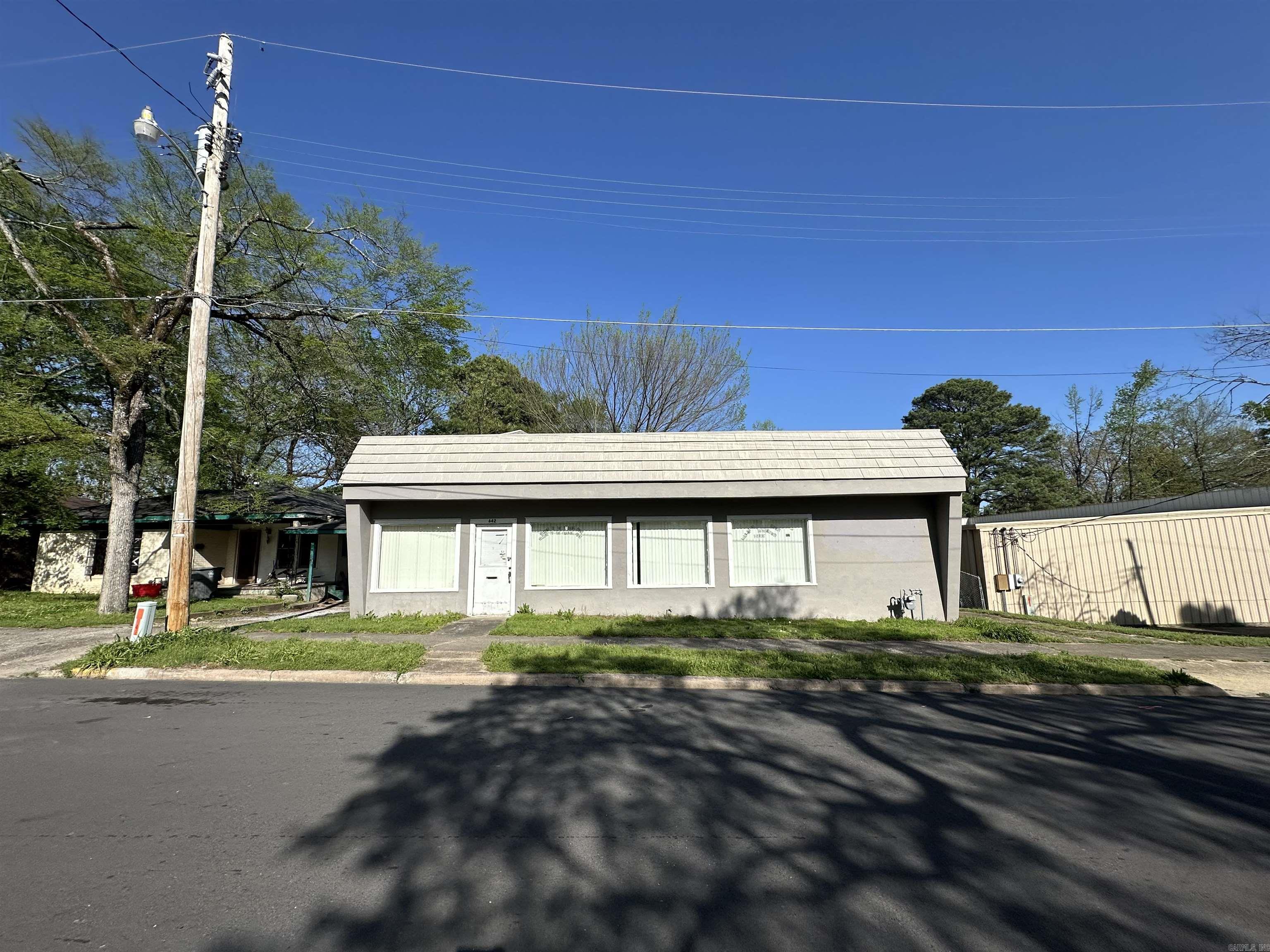 Located in the heart of Hot Springs, Arkansas, this versatile commercial property offers incredible potential for investors or business owners looking to restore and transform a space. Situated at 642 Fourth St, the building features a prime location with high visibility and foot traffic, ideal for a variety of uses including retail, office space, or mixed-use development. While the property is in need of some repairs and renovations, it offers a solid foundation with ample square footage and room for growth. The building’s layout provides flexibility for customization to suit your specific business needs. With the charm of Hot Springs' historic district and proximity to local attractions, this is a unique opportunity to revitalize a piece of local history and capitalize on the city's growing commercial appeal. Whether you’re looking to restore this property to its former glory or develop something entirely new, the possibilities are endless. Don't miss out on this great investment opportunity! Agents please see remarks.