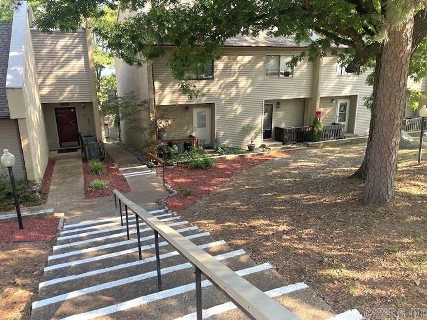 ONE-OF-A-KIND updated Chelsea Condo......with 2 1/2 baths!! It's one of the oversized units with more living space.  Kitchen updated and open to dining area & living room.  Half bath main level. With changes made to floor plan, you have a laundry room, & a nice staircase near the back of the condo.  Two large BRs upstairs, with 2 full baths.   Corners are 'bull-nosed', new wood flooring, & turnkey condition and fully furnished to start using right away!!  A new rear deck with pergola & metal railing.  Beautiful for outdoor relaxation.