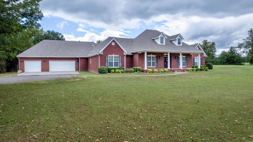 Approximately 15 minutes to the amenities of Chaffee Crossing, Arkansas College of Osteopathic Medicine, and Arkansas Colleges of Health Education, and just 20 minutes to Fort Smith—this beautifully crafted Justin Green-built home offers space, comfort, and privacy on approximately 14 acres in Lavaca. This custom home features 6 bedrooms, 5 bathrooms, and over 4,200 square feet with a split floor plan designed for both functionality and privacy. Quality finishes include solid wood cabinetry, custom built-ins, and Corian countertops. The kitchen includes Energy Star appliances, a pantry, and a breakfast nook. A dedicated office provides flexibility and may serve as a formal dining room. Additional attic space offers room for storage or future use. Outdoor features include a saltwater in-ground diving pool, two ponds (one stocked for fishing), and open acreage suitable for a variety of uses. The oversized 3–4 car garage includes a third bay with two garage doors, one providing access to the backyard, as well as a large storage room offering added space for organization, equipment, or projects. Well-suited for multi-generational living, remote work, or those seeking space for recreati