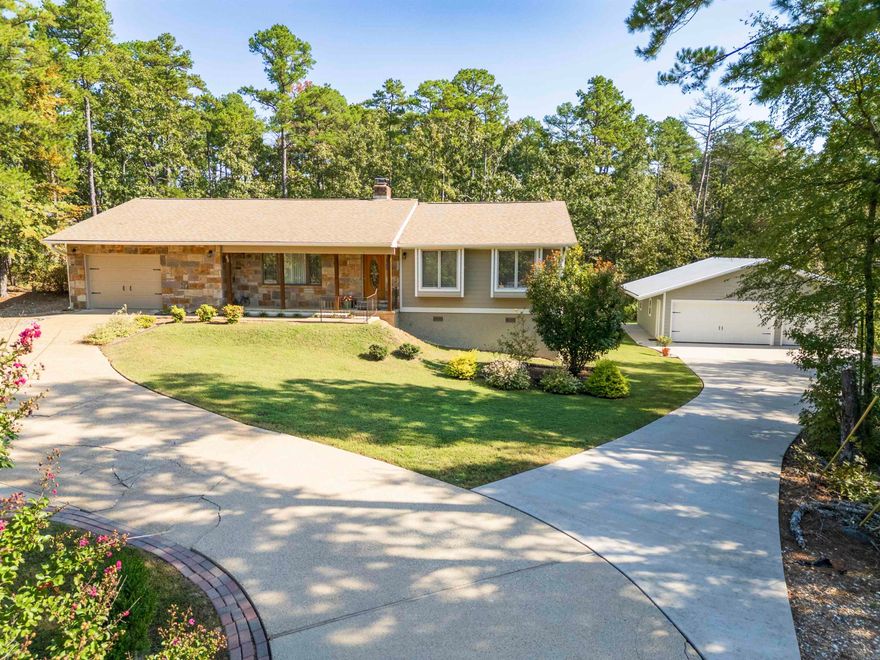 Remodeled Ranch on Two Lots with Shop/Garage.  Discover this beautifully updated ranch-style home nestled on two lots totaling 0.61 acres.  With 3 bedrooms, 3 full bathrooms and an oversized laundry room, this move-in-ready property offers comfort, style, and functionality.  Interior improvements include modern CoreTech flooring; all popcorn removed from ceilings; sleek quartz countertops and stainless-steel appliances in the kitchen; addition of master bath and closet; and interior accessable basement where you will find a walk-in storm shelter built to FEMA specifications.  Mechanical upgrades include a high-efficiency heat pump in 2018 and new 60-gallon hot water heater installed in 2025, ensuring comfort and reliability for years to come.  Exterior improvements include James Hardie cement fiber siding for long-lasting curb appeal with a striking stone veneer on the front facade.  Now to the shop-A separate 900 square foot shop/garage equipped with automotive lifts was added - perfect for car enthusiasts, hobbyists, or extra storage!  Exterior Hardie board siding used to match the home.  Come see all this Amazing property has to offer!  See Agent Remarks for additional details.