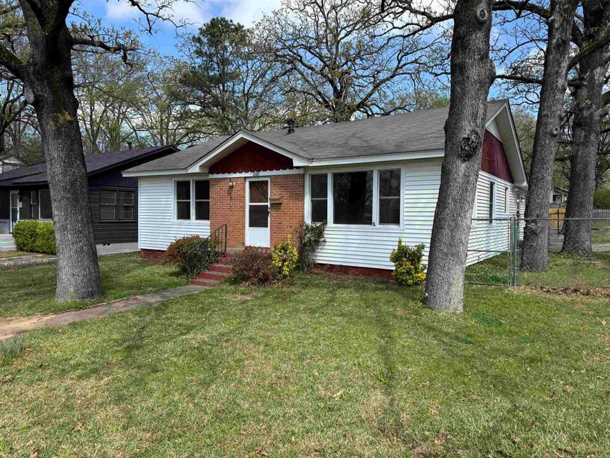 Charming Hillcrest Cottage with new roof and refinished hardwoods sitting on a corner lot. The home features 3 bedrooms with two having their own bathrooms. There are two living areas, separate dining room. The primary bedroom sits apart. There is plenty of parking. Separate fenced in area for man's best friend. Great location with a fantastic walking score.