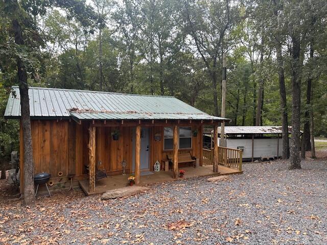 Looking for weekend retreat? This custom-built 2 bedroom 1 bath home features beautiful pine walls and tongue-and-grove ceilings throughout. Relax on the covered deck overlooking the creek or head down to the fire pit for an evening under the stars. The property also includes an RV with its own covered deck ~ perfect for guests or potential Airbnb income. With a boat launch just around the corner, this is the ideal getaway for relaxation and recreation. Best of all, this home comes completely furnished ~ ready for you to move in and start enjoying right away. Truly a must see ~ call today to schedule your showing. ****AGENTS SEE REMARKS****
