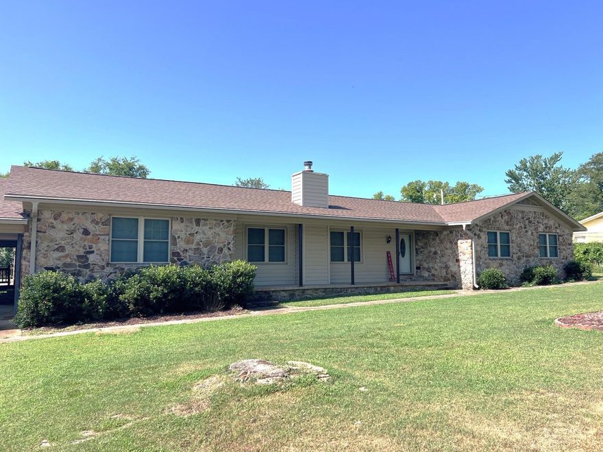 Spacious Home with Apartment, Shop & Endless Possibilities – Minutes from Mountain View!  This well-maintained property is full of potential—perfect for those seeking room to grow, multi-generational living, rental income opportunities, or space for a home-based business or creative studio.  Conveniently located just past the Mountain View city offices, this home offers 4 bedrooms, 3 bathrooms, a large kitchen, formal dining, living room, and an oversized den with a private entrance—ideal for guests, hobbies, or workspace.  A one-bedroom apartment with kitchenette connects via an enclosed breezeway to the main home, offering privacy and flexibility for short- or long-term use. The spacious interior features custom cabinetry—perfect for hosting, organizing, or entertaining—plus updated bathrooms and generous living spaces.  Outdoors, enjoy a private covered porch, 1-car garage with workshop, 24x30 shop with plumbing & electric, and a 4-car covered carport. A new roof and professionally repaired pier & beam foundation offer peace of mind for years to come.