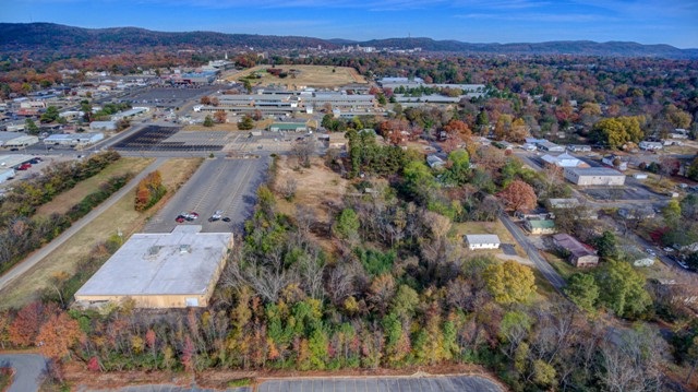 Excellent high traffic 4 ac +/- commercial parcel. Develop this land to suit your needs and watch your business grow. There is a home located on this property; however, it is of no added value.
