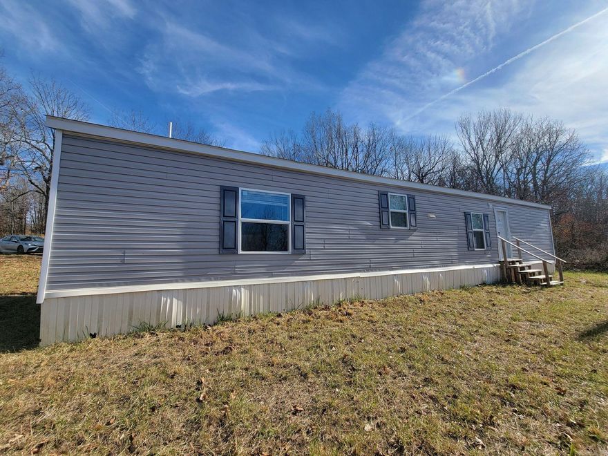 If you need a place of your own that's removed from the rat race, this beautiful country setting is just what you're looking for!  Very nicely maintained mobile home located in the country, but still just a few minutes from groceries, gas, and necessities.   Plus, it's only about a 30 minute drive to Mountain View and all the amenities and entertainment it has to offer!