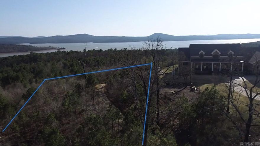 Beautiful lot with an incredible Lakeview, Western mountain range view, and a great view of Pinnacle Mountain! This lot has flat space to build on and is incredibly spacious! It also offers an amazing amount of privacy. Once you drive through the amazing gated entrance of Waterview Estates you will see the neighborhood offers unique amenities such as a tennis court, pickleball courts, basketball courts, soccer and football field, community bonfire area and miles of nature walking trails!