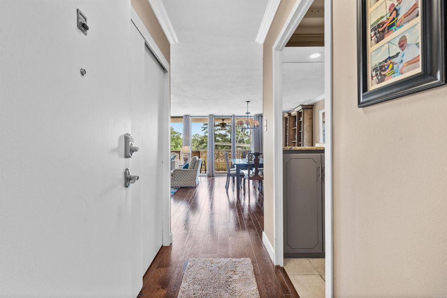 This is the perfect lake place for someone with kids and grandkids!!! Lots of space in this "larger than most" (1390 sf) tastefully decorated Lake Hamilton condo that includes a bunk room and a crib room as bonus areas. The available large boat slip and the spacious porch are features that enhance the value. A custom designed floor plan and bedrooms located on opposite sides add to the privacy and spacious feel. There are also 2 covered parking spaces. Beacon Manor owners enjoy beautiful gated grounds, a large pool, family room, tennis & pickleball courts, barbeque grills, elevators for easy entrance and electronic security building access. The prime location is close to town and provides a wonderful view of the lake's main channel. Short term rentals are allowed for potential extra income.