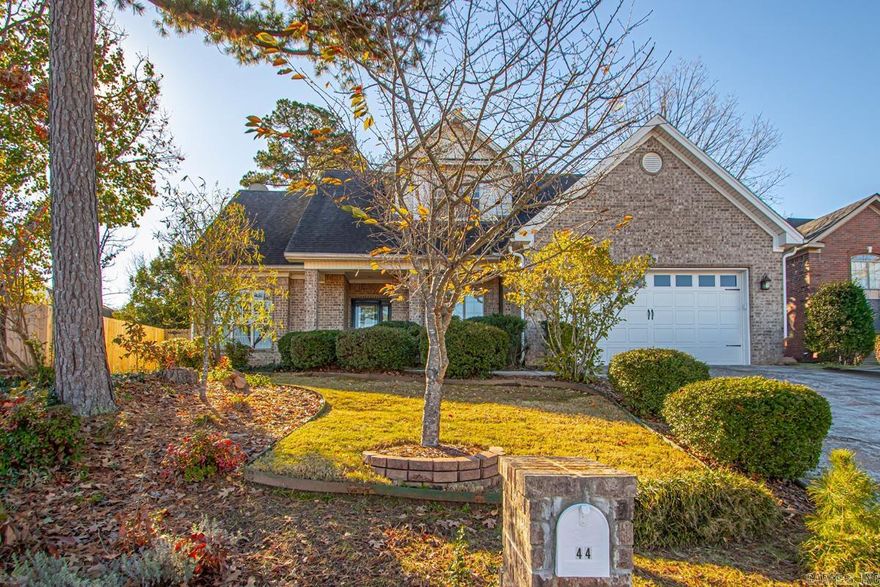 Welcome to this inviting 4 bedroom, 2.5 bath home in the heart of Maumelle.  The main level includes the primary bedroom for added convenience and privacy.  Large windows throughout the home fill the living area with natural light and a two-way fireplace adds a unique touch that creates a warm, cozy feel between the living room, breakfast area, and kitchen. A separate dining room offers a comfortable space for family meals or entertaining.  Upstairs, you'll find three additional bedrooms, ample closest space, and a full bath, providing plenty of space for kids, guests, or a home office.  Outside, enjoy a peaceful, private backyard with convenient access to Maumelle's schools, parks, trails, and amenities.  This home blends comfort, functionality, and an ideal setting ready for its next owner.