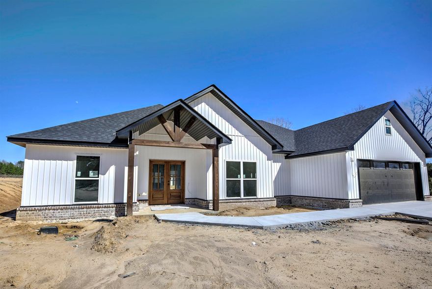 Brand new construction home sitting on 3 acres with matching shop! Home is in the final stages of construction and just adding the final finishing touches. Come enjoy the beautiful opportunity to own you little piece of paradise! This home has 3 bedrooms and 2 baths, featuring a split floorplan and extra flex space that can be used as an office or formal dining. Contact us today to setup your showing!