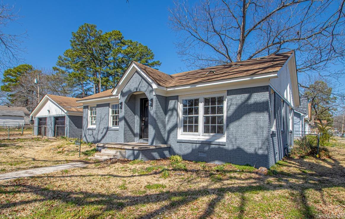Beautiful Remodeled home with original refinished Hardwoods, Close to UALR, eateries and shopping Large corner lot with 2 car garage with extra storage shaded lot A MUST SEE