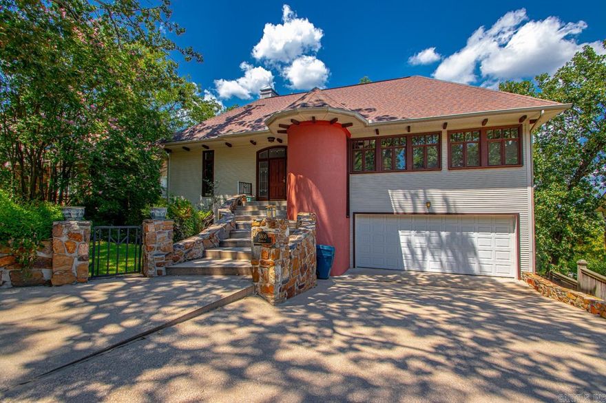 Come see this amazing home with a view!!  This home is so unique with a turret, you will not want to miss seeing it!  Immediately walking in you notice all the natural sunlight with all the big windows.  Living room opens up to the kitchen and into the dining room. Stainless appliances are 5 years old.  Also on the main level is an office and 1 bedroom with a full bath.  The next level is where the main bedroom/bath suite will be.  The third level has the another bedroom with a wonderful large family room.  There is more....don't miss the workshop/bonus room.  There is a 3 level deck that is perfect for entertaining!  The gorgeous Gunite  pool with all the surrounding stonework will be wonderful this summer! This home is walking distance to Hillcrest shopping, parks and restaurants! See Agent remarks!