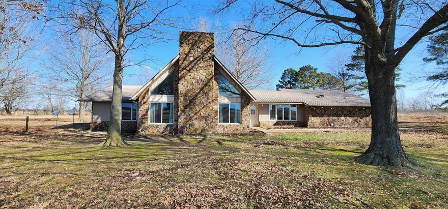 Take a look at the BEAUTIFUL new listing. Resting in the middle of 1.48 acres, this home features 3 bedrooms, 3 bathrooms, a loft, and almost 3400 square feet. All you have to do is walk in and you will fall in love with the enormous kitchen. The kitchen features solid surface counters, tile floors, and stainless appliances. The living room features tall vaulted ceilings, a fireplace, and a loft that could be used as a 4th bedroom, office, or game room. The primary bedroom and bathroom are an oasis to retreat to. The master bathroom will take your breath away with the size of the shower that features dual rainfall heads, pebble tile floor, and beautiful ceramic tile. There is also a large soaking tub if you want to ease the stress of the day away. The home also features a large laundry room, 2 car garage, and spacious 2nd and 3rd bedrooms. There are hardwood and tile floors in the main areas of the house, but the bedrooms do feature carpet for a more comfortable feel for relaxing. Once you walk outside, you will notice the abundance of mature trees and the seclusion that comes from with country living yet still being close to Wynne, Jonesboro, and Searcy. Don't miss out on this!