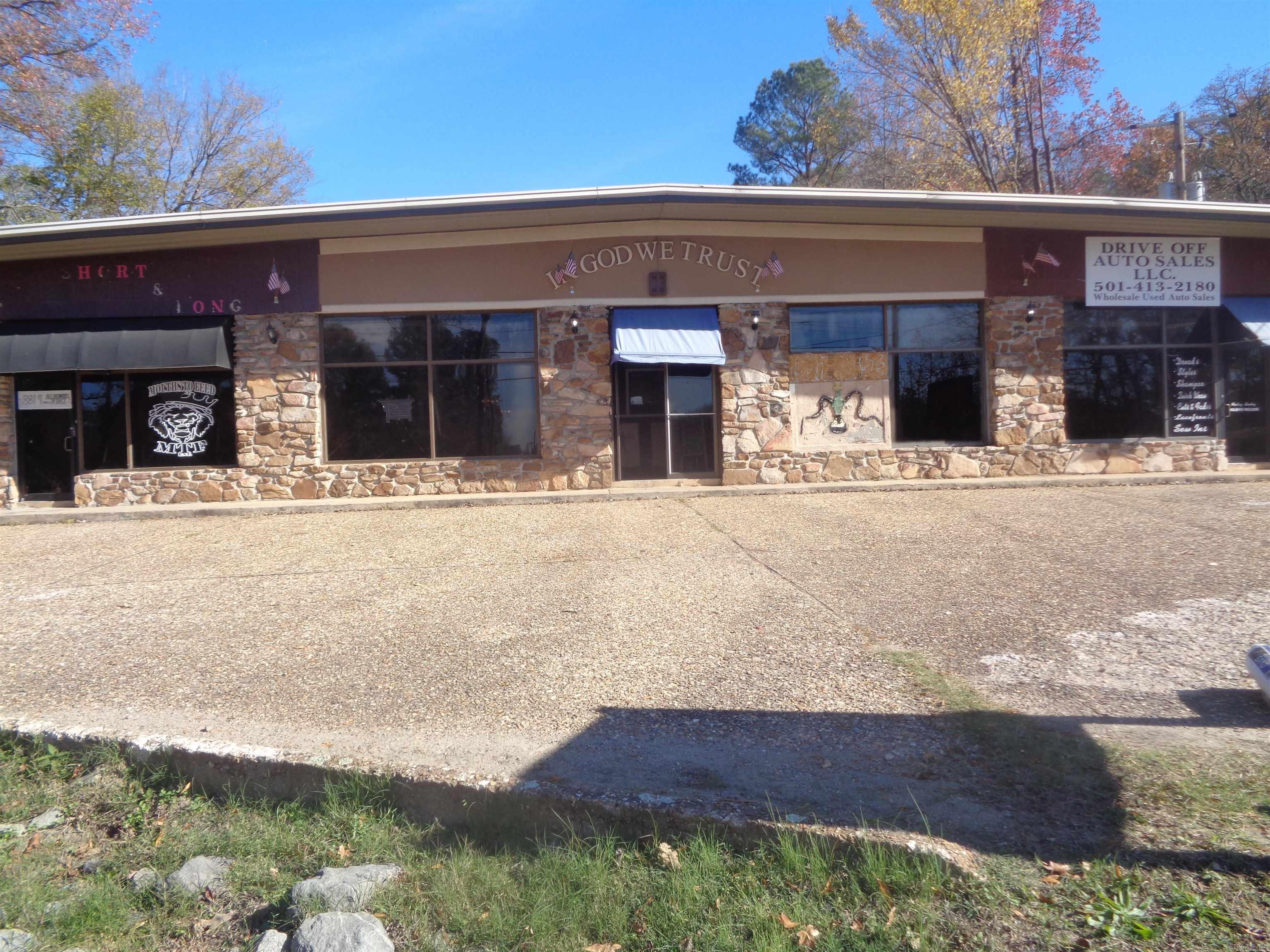 Large commercial building currently set up for three (3) types of businesses. Extremely high traffic flow. Property is being sold "As Is". Shown by appointment only. Per the City of Little Rock, the zoning is open to all types of entities. Property is currently being rented on a 6-month lease.