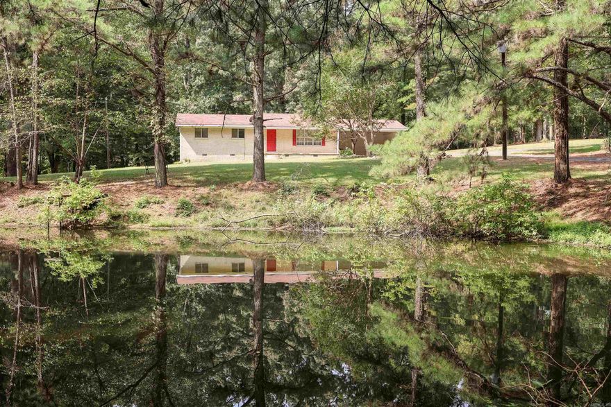 Charming brick home on 3.52± acres just outside Arkadelphia! This 3-bed, 1.2-bath home offers 1,546 sq. ft. of living space with a practical layout. Enjoy the paved driveway, pond, and plenty of space for outdoor activities or future plans.