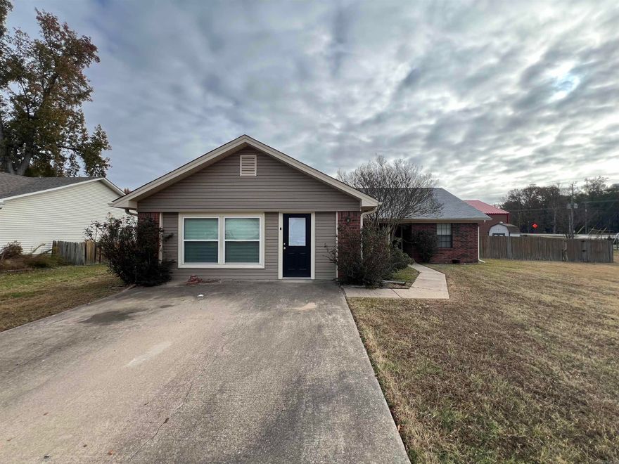 Walk to Elementary school! This lovely 3 bedroom home is very well maintained and looks the part! Relaxing large living area with fireplace. A true cook's kitchen with lots of storage, island and stainless steel appliances. Off the kitchen are built-ins with office area. Master has his and her closets with a master bath with jetted tub and walk in shower. Home also offers a enclosed garage that could be used as a playroom or mancave! A perfect home for you!