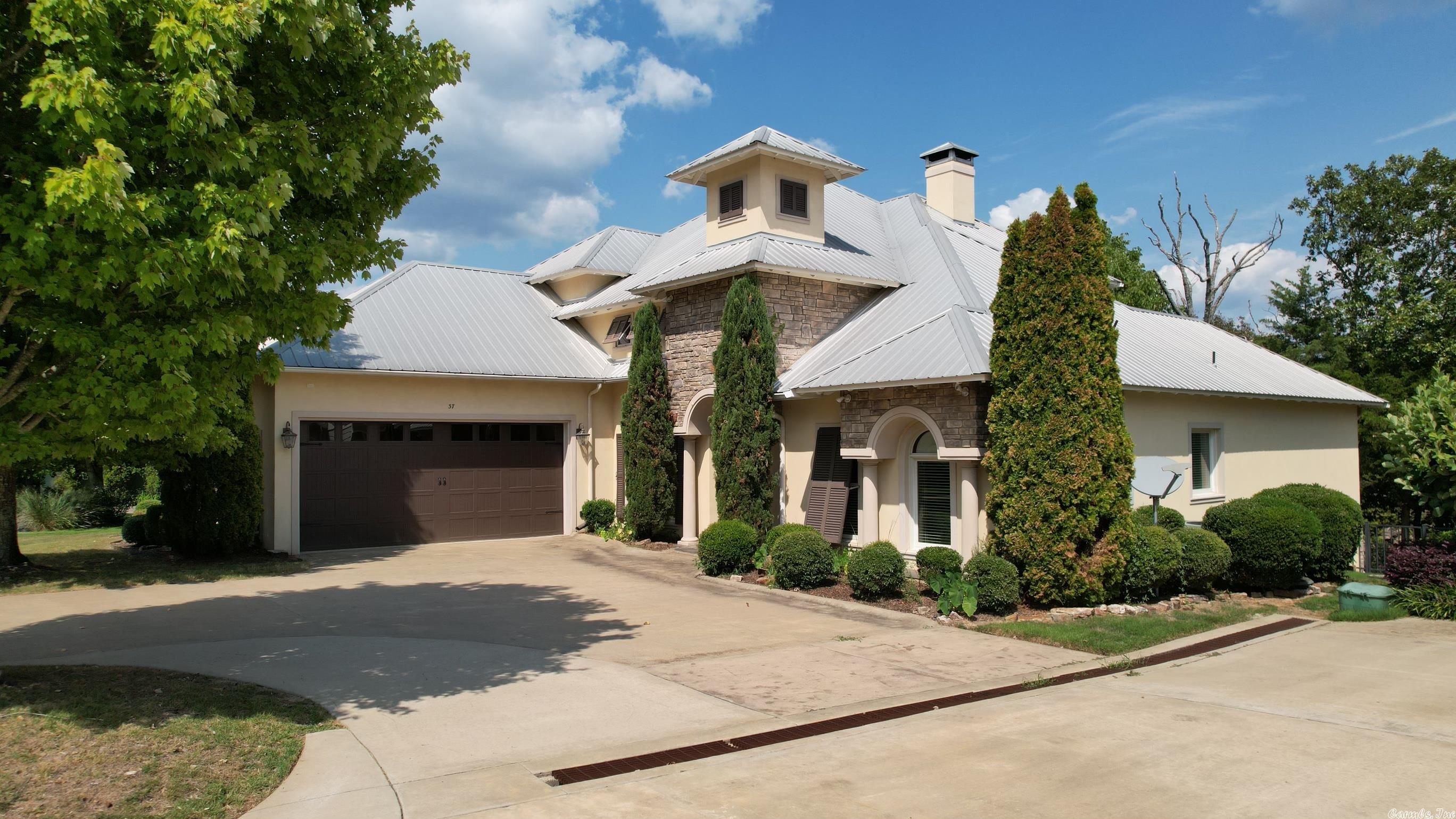 ALL OFFERS CONSIDERED on this gorgeous custom designer LAKEFRONT home on GREERS FERRY LAKE in the Brighton Pointe Subdivision. Every detail has been addressed in this home! Featuring an open floor plan, wood floors, rock fireplace & beautiful crown molding. You will love the outdoor space overlooking the lake which makes the perfect home for entertaining. With the outdoor fireplace, you can enjoy this space all year round. Schedule your private tour!
