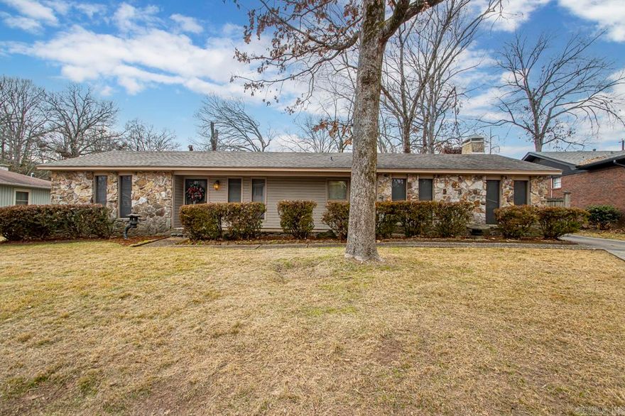 Welcome Home! This One owner home has been tenderly taken care of and loved on for many years! Feels like home when you walk in the front door! Two living areas! Separate Dining room! Super cute kitchen! Refrigerator conveys! Desk area for bill paying/homework doing! HUGE family room w/fireplace! Room for everyone!  Back living area would make a great home office or home school room! Large level lot! Parking in rear! Greenview Circle is a wonderful street! Walking distance to the park, tennis center & local elementary school! Come see it today!  See agent remarks...