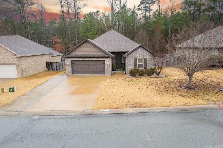 This perfectly maintained 3 bedroom, 2 bathroom home is located on a peaceful street in a highly sought-after established neighborhood. As you enter the home, you'll be greeted by the tall ceilings in the open concept living room and kitchen. The kitchen has granite countertops, stainless steel appliances, and plenty of space to entertain guests around the table and the breakfast bar. The living room and kitchen have new LVP flooring, making cleanup a breeze. Featuring dual closets and an oversized shower/tub the primary bedroom is located separately from the other bedrooms, providing a peaceful retreat after a long day. The covered back porch overlooks a greenspace, offering a quiet oasis for relaxation and entertaining.  The carpet in the bedrooms was replaced in 2020, ensuring that you can move in with peace of mind. Don't miss the opportunity to make this beautiful home yours. Schedule a tour today and experience the perfect balance of suburban living and city convenience.