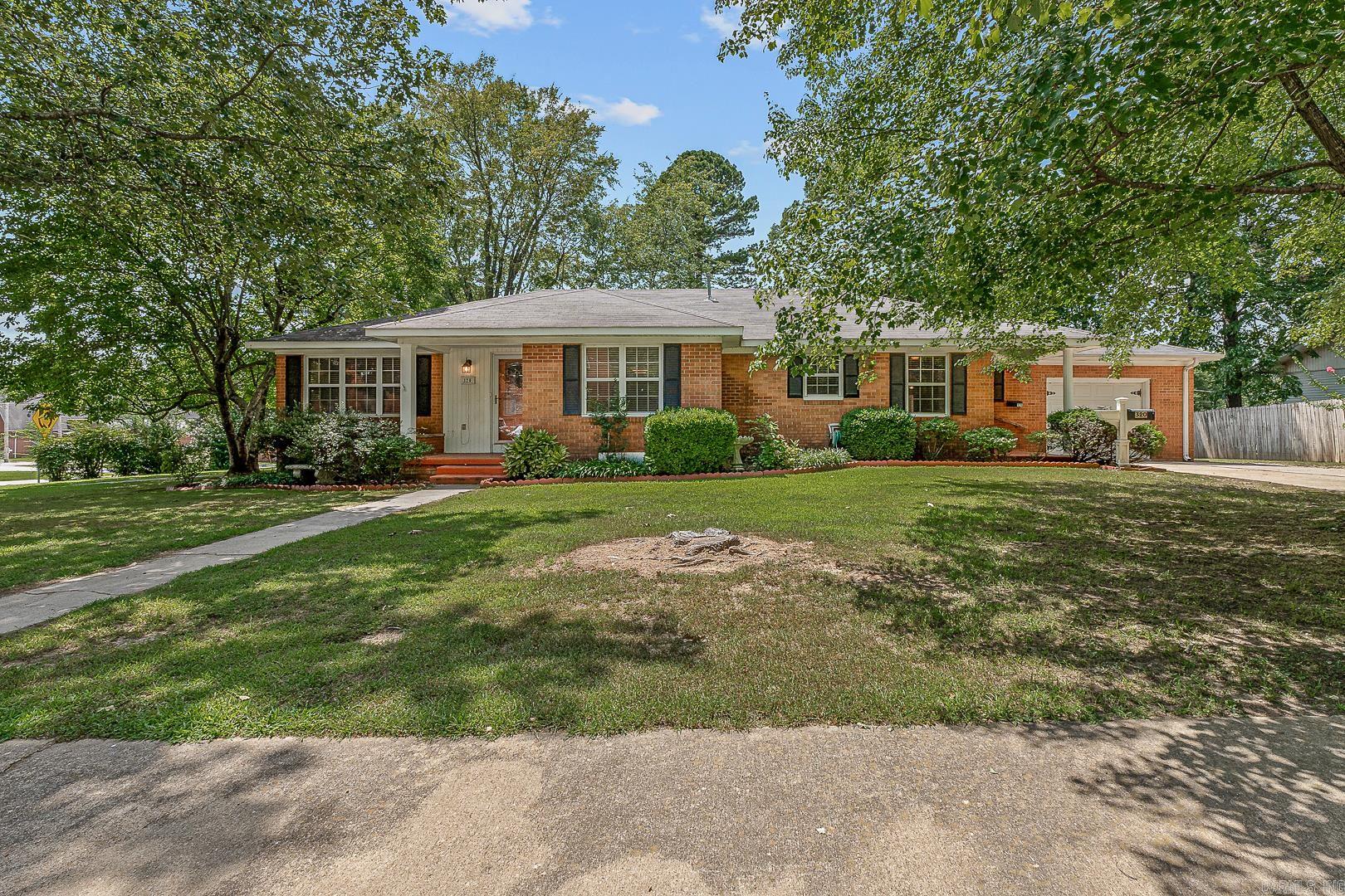 Welcome to 320 N 5th Ave a 3 bed, 2 bath home with 2,285 sq ft, sitting on a corner lot in Piggott. Inside, enjoy a large open living area, a kitchen with tons of storage, and a bright sunroom-style back porch. Outside, you'll find a 10x20 workshop and in-ground storm shelter. Well-maintained and move-in ready.
