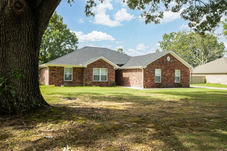 Need a home with a country feeling yet minutes from the city! This 3 bedroom 2 bath home has a large lot with a fully fenced back yard with covered back porch. The master bedroom has a new handicap walk in bath tub and a walk in shower. Enjoy the open floor plan with plenty of space for entertaining. Washer/Dryer and Refrigerator will Convey.  Don't miss out on this beauty!