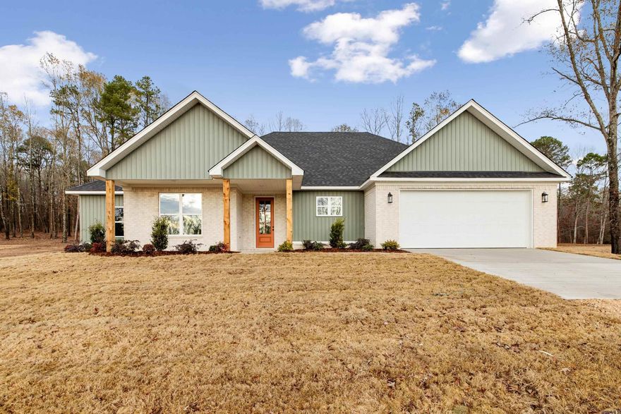 Beautiful 2200 sq ft home offering 4 bdrms & 2 baths, situated on spacious 1.13 acres. The open concept kitchen features a large island & walk in pantry, perfect for cooking & entertaining. The living room boast a vaulted ceiling & stunning brick fireplace, creating a warm & inviting focal point. Step outside & enjoy the large backyard with plenty of room. This property offers space, comfort, & functional layout both inside & out.