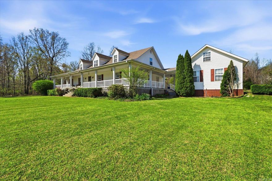 BEAUTIFUL LOCATION & HOME w/City Utilities. Sitting on 7.3 acres mostly in city limits. Barn & fenced for small animals. Very Lg Shop w/Overhead door. (Shop & Barn have electricity.) Home features 3 BR/2.5 BA. Hidden upstairs is an attic w/stairway that could easily be finished into Lg. bonus room or extra BR w/electricity & plumbing. Also stairway in 2 Car garage to a fully floored attic w/ electricity that could easily be finished into office or extra room. Roof 6 yrs old. SO MUCH MORE!!