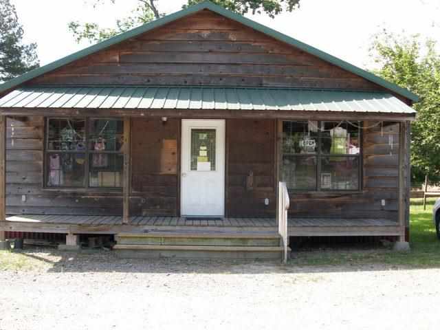 Great location for a business. Hwy 367 frontage and plenty of parking with 2 separate entrances off the hwy. Cedar front building with nice metal roof. Very open interior with 1 back room, 1 dressing room and 1 bathroom. Business hours are Monday thru Saturday 10-4.