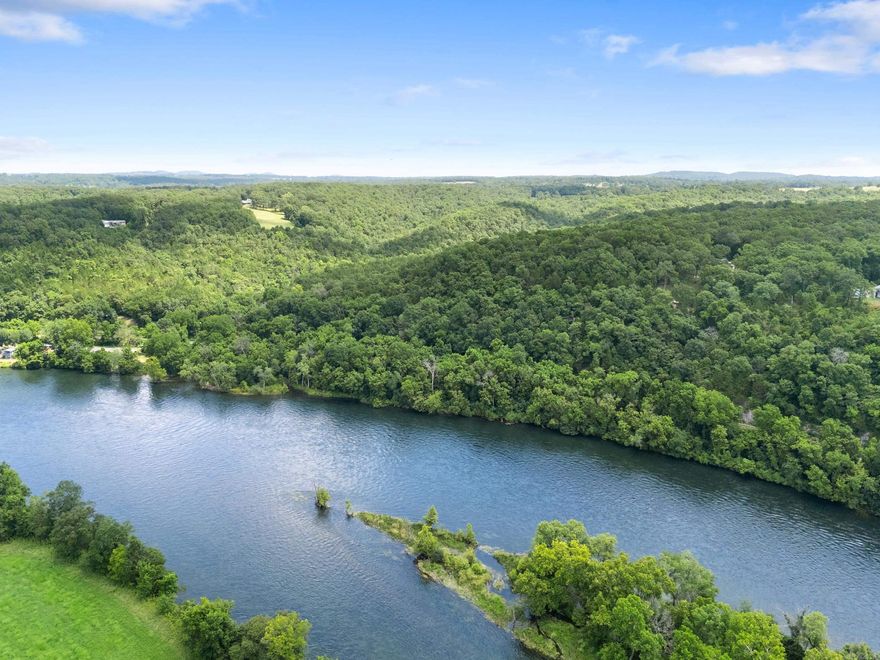 Discover the ultimate outdoor retreat on this 167 acre m/l property in the Ozarks with direct access to the White River. Featuring three caves, waterfalls, multiple year-round creeks, and an extensive network of trails, this land offers endless recreational possibilities—from hiking and ATV riding to exploring the natural wonders on site. Enjoy panoramic bluff-side views and prime hunting opportunities in a secluded yet accessible location near Rim Shoals and local hiking trails. A home and shop are included, offering a great opportunity for renovation into a cozy hunting cabin, vacation getaway, or full-time residence. With electric, well and septic already in place, the property is ready for your vision. Whether you’re an outdoor enthusiast, hunter, or investor looking for unique acreage with water features and river access, this property delivers unmatched potential in a breathtaking natural setting. Don’t miss this rare chance to own a slice of Arkansas wilderness. Priced below appraisal value.