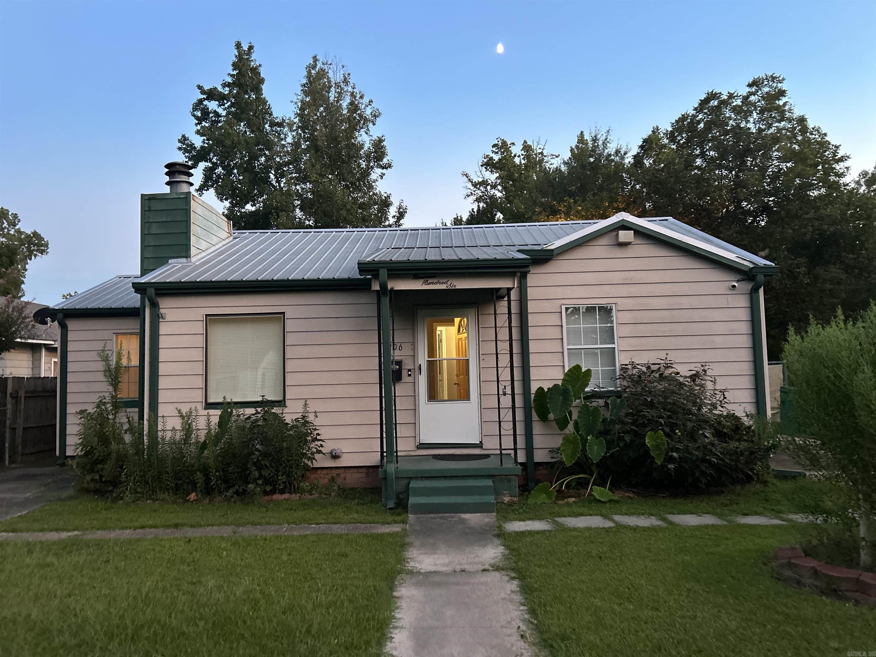 Wow! You will love this renovated family home in the center of town; renovations include updated baths & kitchen, a sunroom, wet bare, and more. There is one bonus room that could easily be converted into a third bedroom! This home is affordable and move-in ready! Don't wait, call today!!