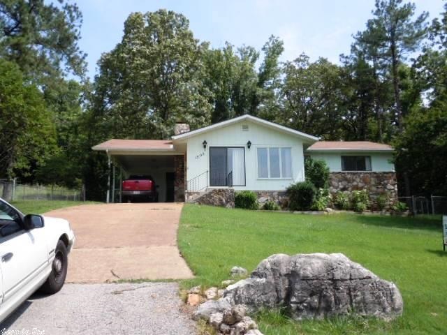 LAKE LOVER? Picture this: scenic lake view lot with lots of mature shade trees, like new 2 bd/2 ba ranch home in quiet, peaceful surroundings plus completely fenced 3rd lot available. Open floor plan, large breakfast bar island w/2 stools, 7x19 sunroom/office on front of house, 13x18 screened porch & 13x20 open deck on back of house. Fenced back & side yard, in ground sprinkler system, wood burning f/p w/insert in lr, walk-in closet in mstr bdrm w/built-in safe. Lot dim & rm dim are approx. & rounded down.