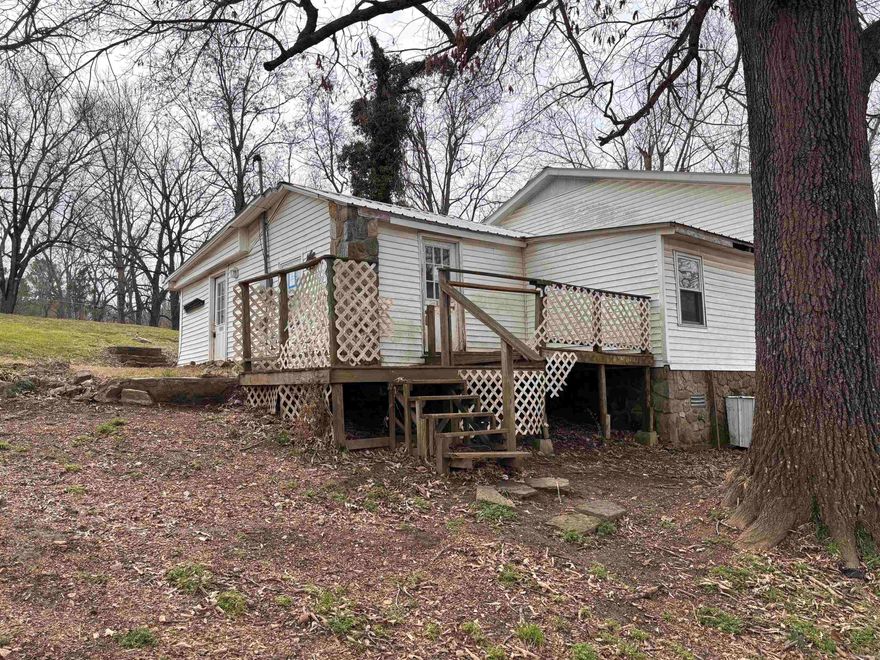 Located minutes from Spring River Access! Don’t miss out on this three bedroom home! The Potential is endless. Buyer must verify all information about property.