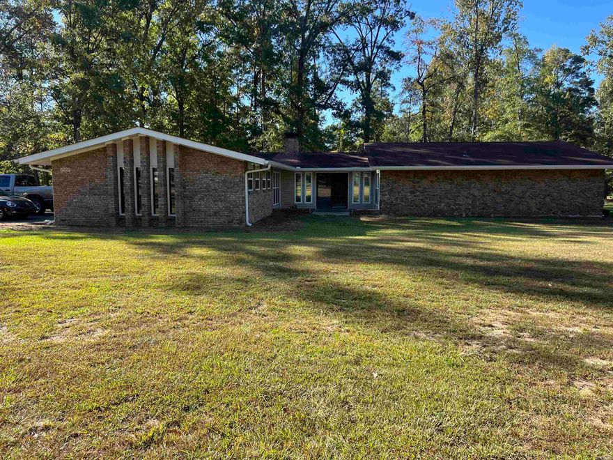 Beautifully maintained and recently remodeled 3 bed 2 bath brick home on 4.88 acres.  This home has newer flooring, updated lighting throughout the home, new paint, new countertops, new stainless steel appliances, updated tiled shower and more sitting on 4.88 acres