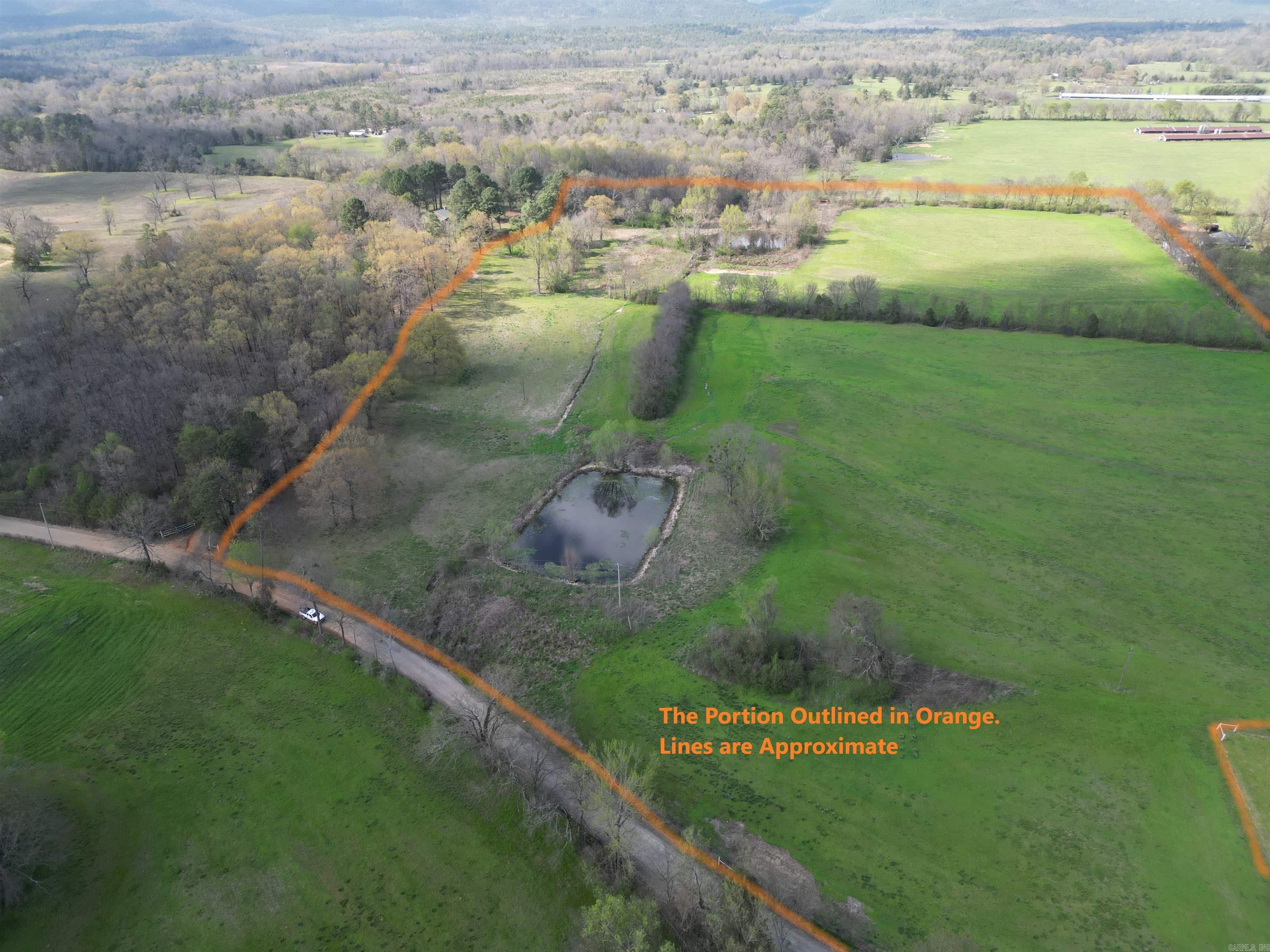 Discover your slice of rural paradise in Polk County, Arkansas! This pristine 29.56-acre parcel, recently surveyed, offers a blend of serene pasture land and practical amenities. Enjoy the open expanse, ideal for livestock or recreation, complemented by two tranquil ponds. A valuable storm shelter provides peace of mind. It is Partially Fenced. The land is ready for your vision! Embrace the breathtaking panoramic views that stretch across the rolling landscape, offering a daily spectacle of nature's beauty. This property presents a unique opportunity to create your dream homestead or weekend retreat in the heart of Arkansas's scenic countryside!