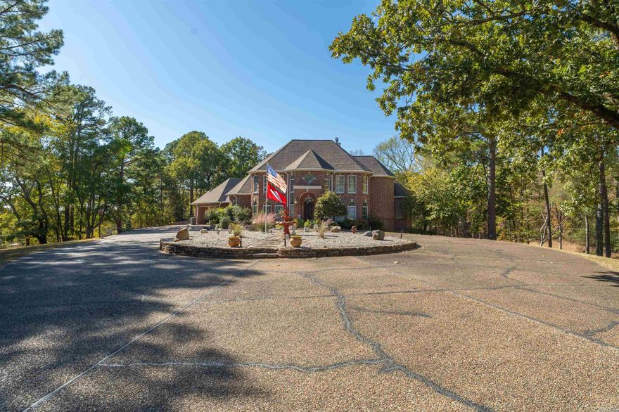 Discover the perfect blend of comfort and convenience at 113 Woodland Heights, set on 3.36 peaceful acres with a backyard pond and located just under a mile from Lakeside School.  Inside, the 4-bedroom, 3.5-bath layout offers ample space for everyday living and entertaining. A welcoming foyer sets the tone, leading to an open floor plan with a gourmet kitchen, perfect for cooking and hosting guests. The primary suite on the main floor provides a private retreat with a spa-inspired bathroom. Upstairs, three additional bedrooms offer flexibility, with two connected by a Jack and Jill bathroom, ensuring convenience for family or visitors.  Step outside to find a spacious deck equipped with an outdoor kitchen and a 7x15 spa—ideal for hosting friends or unwinding after a long day. The expansive property, with its pond and wooded surroundings, adds a peaceful, natural backdrop to the home.  A 25x42 garage/workshop offers plenty of storage and space for projects, making this home as functional as it is beautiful.  With its generous acreage, well-designed living spaces, and proximity to Lakeside School, 113 Woodland Heights offers a rare combination of privacy, style, and convenience.