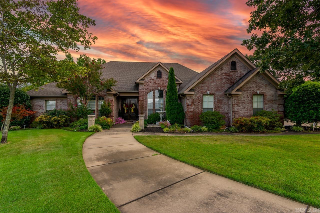 Immaculately maintained 5-bedroom, 3.5-bath, 3,148 sqft home in West Conwayās sought-after Bristol Place subdivision. Built in 2006, this traditional beauty features fresh paint, custom wood floors, and multiple living spacesātwo with gas fireplacesāplus a formal dining room. The kitchen offers granite tile countertops and a large corner pantry. The primary suite is a true retreat with dual vanities, a soaking tub, custom-tile shower, and wrap-around closet. Storage abounds with walk-in closets, built-ins, hall closets, and attic space. Set on a landscaped corner lot with one of the premiere lawns in Conway, the fully fenced backyard includes an entertainerās dream patio. With four garage spaces (including a detached garage), thereās room for all your vehicles, toys, and tools. Conveniently located just minutes from shopping, dining, and all that Conway has to offer, this home blends elegance, functionality, and curb appeal.