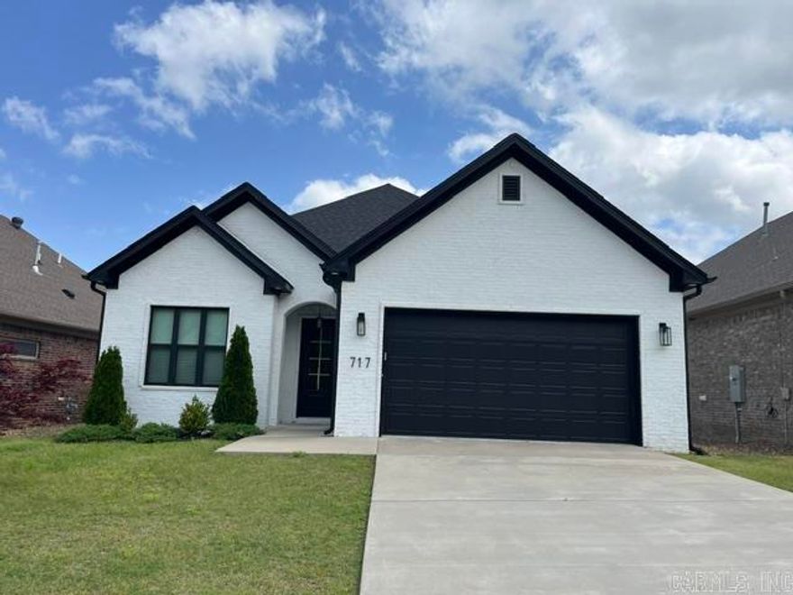 Check out this modern three bedrooms/two baths home in the Wildwood Place Subdivision. the primary bedroom in the back give excellent privacy. The patio in the back, the built-in fireplace in the living area, along with the tall ceilings through out the home are nice bonus.  Property has a formal dining area in addition to breakfast bar in the kitchen. Beautiful floor plan... Seller Never Occupied the property.