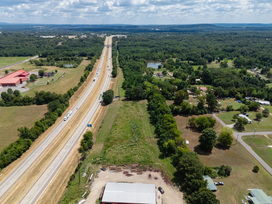 11 Acres Industrial Land with I-40 Frontage! Excellent opportunity with prime visibility along I-40. Zoned partly Industrial and Residential, this property offers high traffic exposure and easy access, ideal for commercial or industrial development. Rare find with endless potential for investors or businesses looking for expansion space.