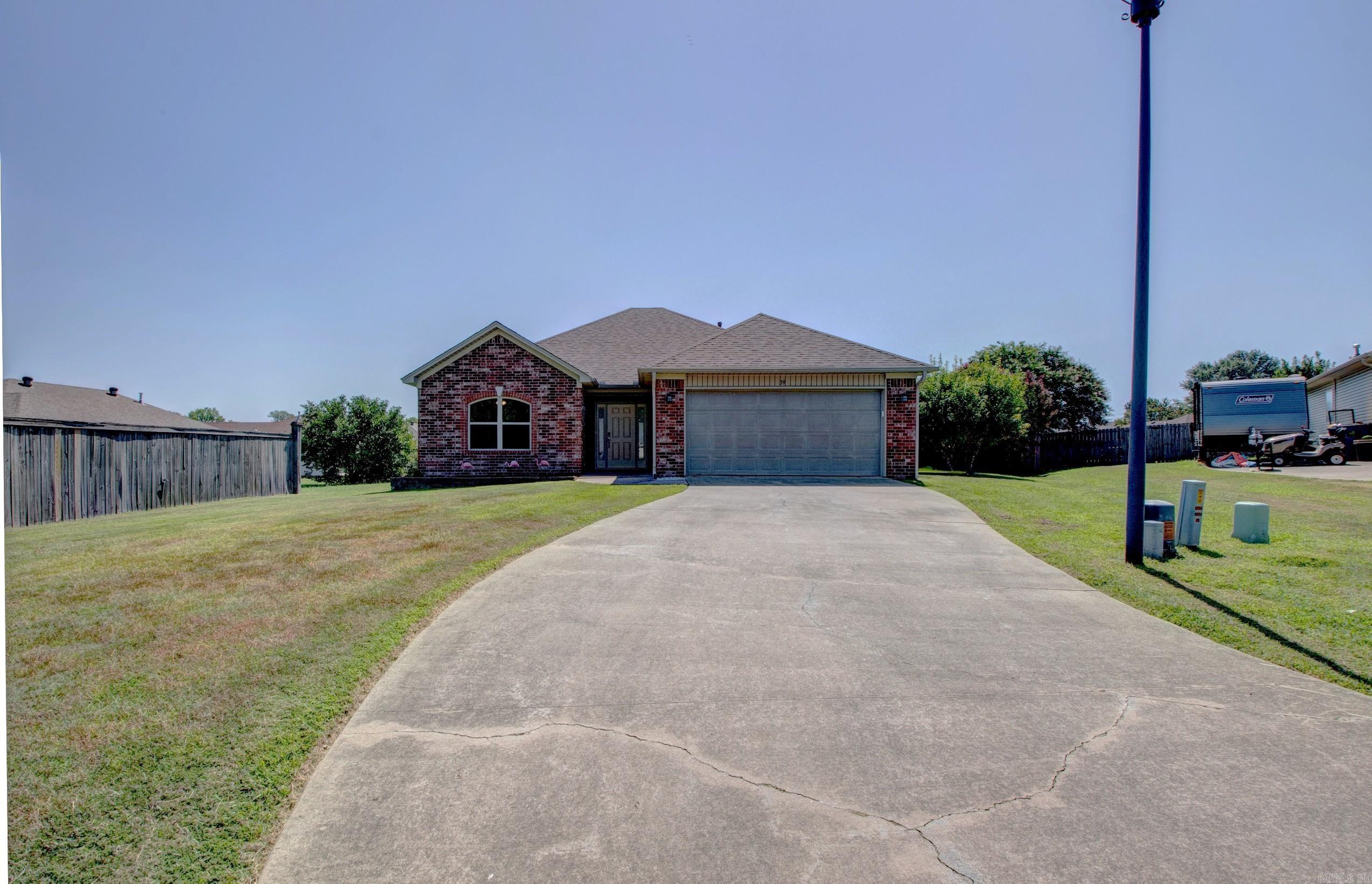 Absolutely STUNNING Home in a cul-de-sac!! This 3 bed/2 bath house has an extra large backyard for entertaining, letting the kids run around, or spoiling your fur babies with an oversize space to run. Enjoy time with family and friends inside your eat-kitchen with the *Refrigerator that conveys* and split floor plan living area. Escape to your large master suite with his and hers closets and jetted tub. Call for your personal showing! This one won't last long! **Agents please see remarks**