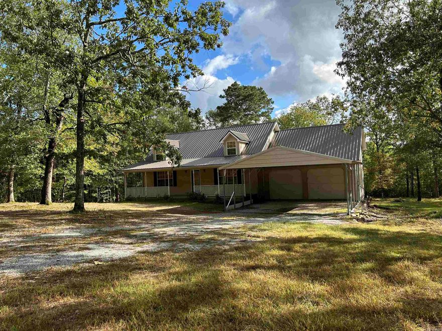 Check out this spacious Ozark Mountain home located just a few short miles from  the charming town of Mountain View. Sitting well back from the road on 9.85 wooded acres with a buffer of mature trees between the road and the house, this home offers plenty of privacy. The drive to the home is pavement all the way, no dusty or muddy dirt roads! On the main level of the home is the kitchen, combined living and dining room, half bath,  laundry room, and two adjacent office rooms which could be combined to make a spacious bedroom. Upstairs is the master suite and bath, a second full bath, another bedroom plus a bonus room/bedroom that is also accessible from a separate staircase located in the garage. The second level has several walk in closets providing ample storage. The 672 square foot walk out basement contains a safe room as well as pantry storage and a large room that could be finished out to provide additional living or sleeping areas or both. The home has plenty of sheltered parking with both a two car garage and a double carport. Enjoy the outdoor living space provided by the covered front porch and a spacious multilevel deck off the back. New roof in 2021.